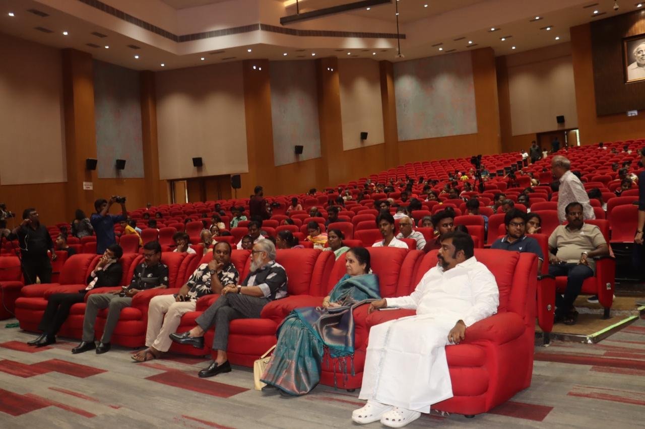 Chief guest addressing a student gathering