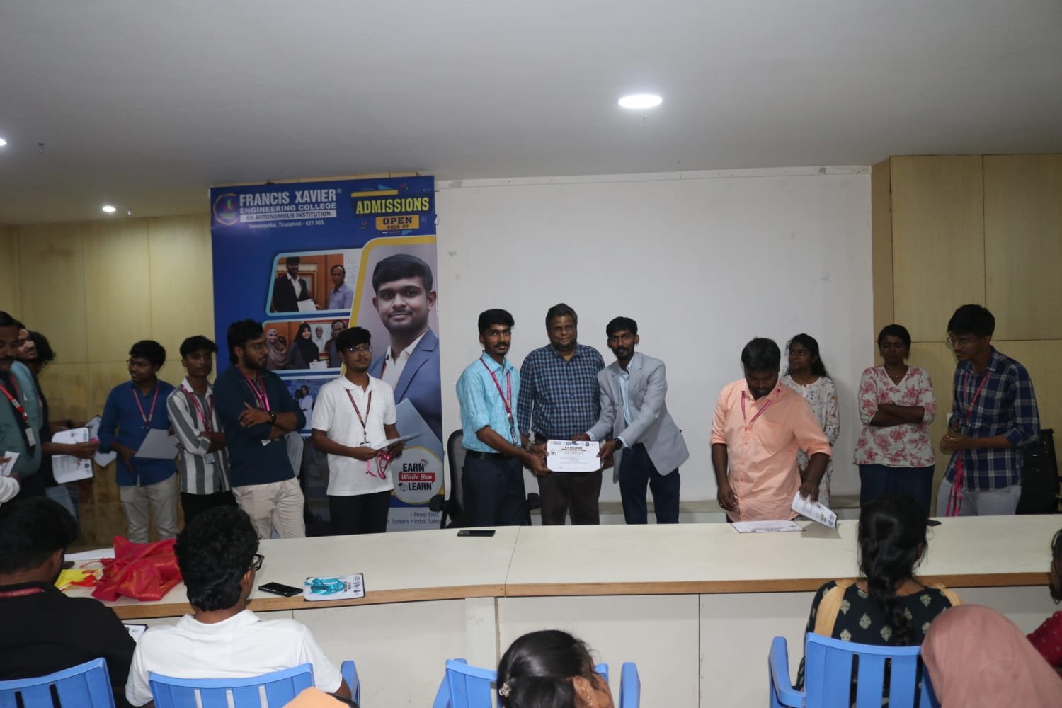 Chief guest addressing a student gathering